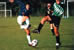 [photo: football match]